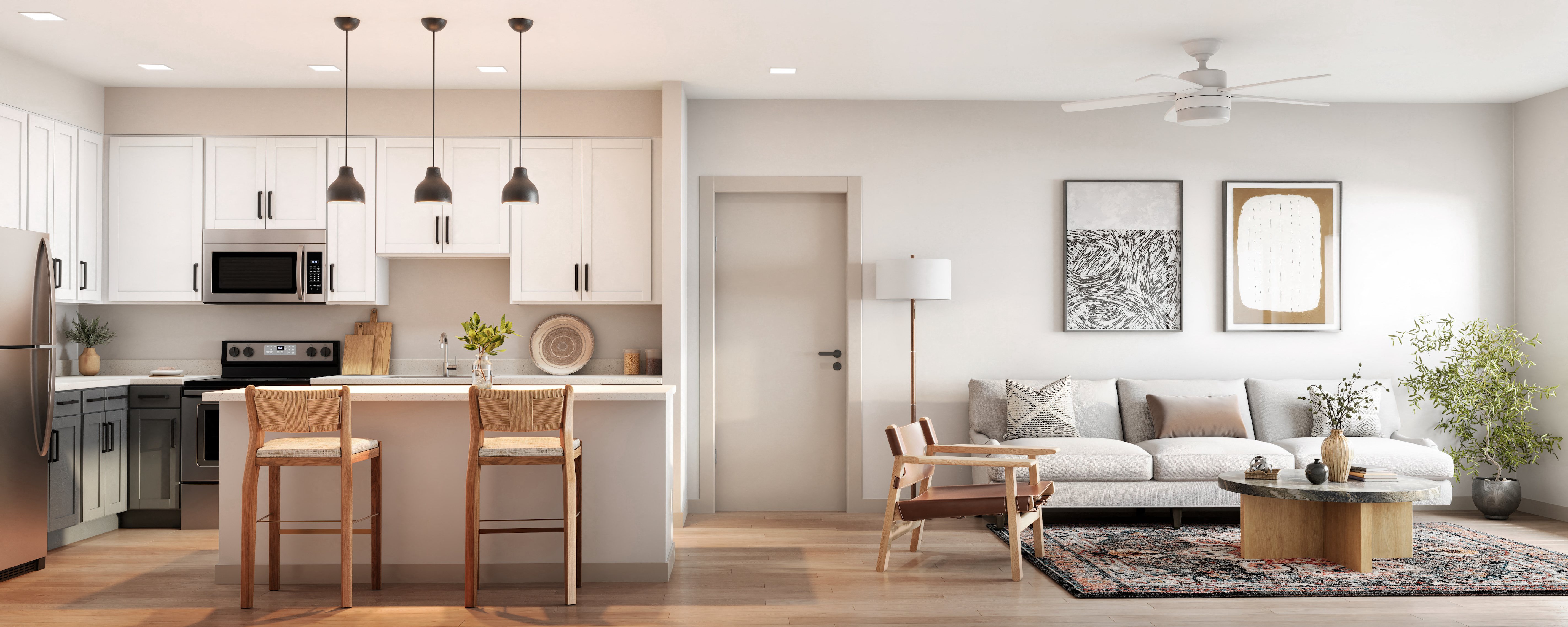 a living room and kitchen with a couch and a table